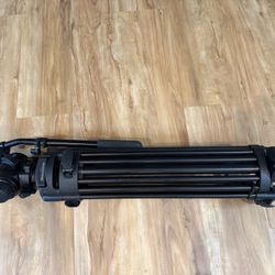 VariZoom Professional Video Tripod  Includes: • VariZoom fluid video head • VariZoom tripod • Original carrying bag • Quick release plate  Great tripo