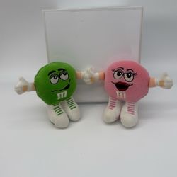 vintage M&M's "Swarmees" mini plush characters, specifically the Green and Pink versions.