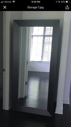 Full length mirrored armoire