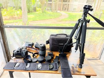 Canon EOS Rebel T7 DSLR Bundle – 2 Lenses, Tripod, Camera Bag, 2 Batteries