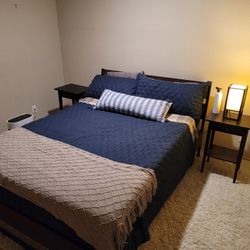 Two Ikea Hemnes night stands, black-brown