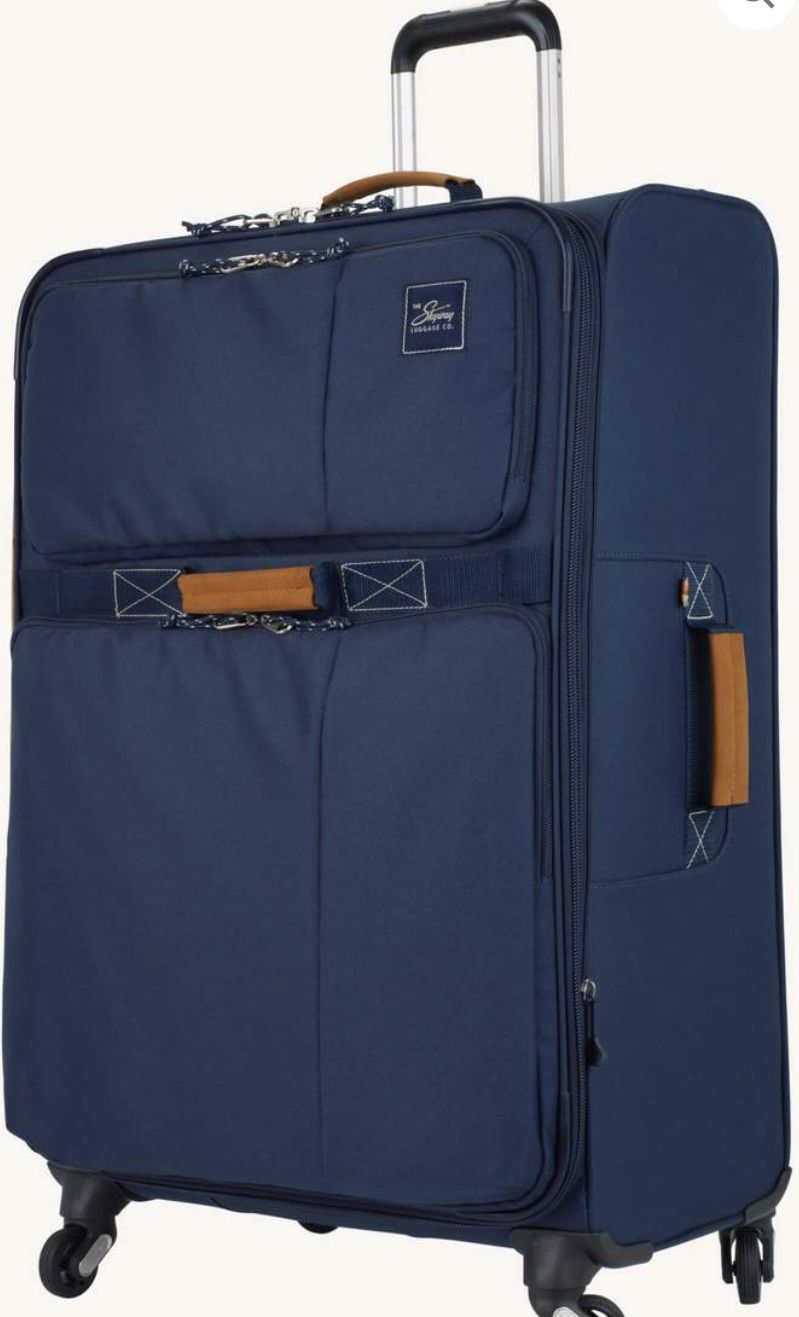 New never used 28” lightweight suitcase by Skyway