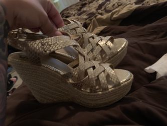 Jessica Simpson gold wedges