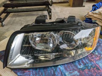 2002 Audi A4 OEM headlights, both.