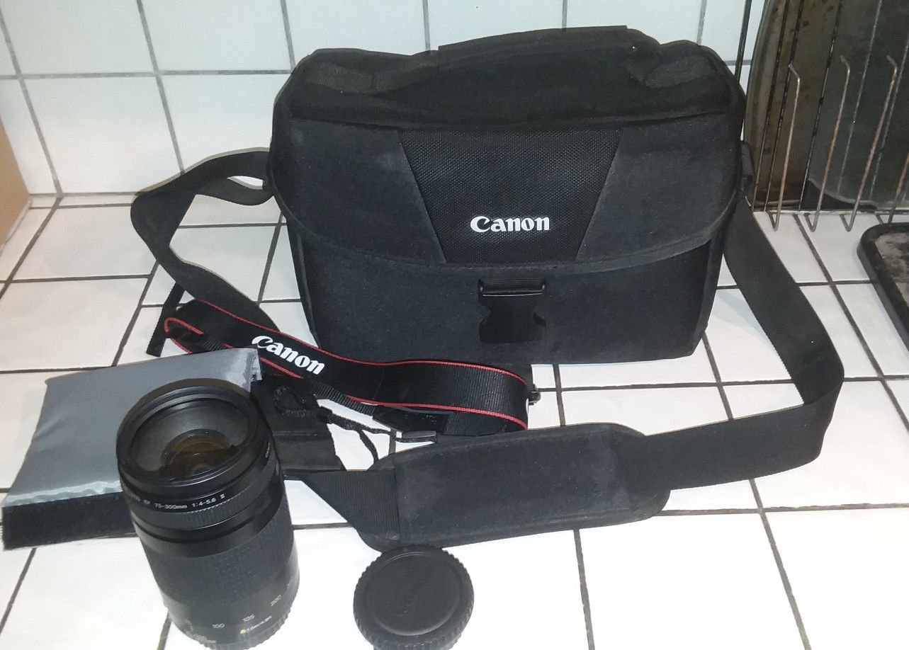 CANON camera lens , camera bag and camera strap