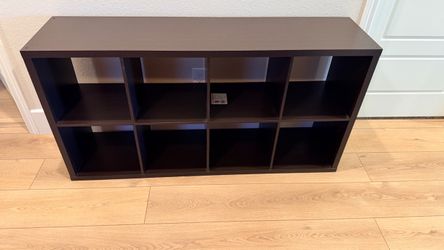 The KALLAX cube storage unit in black-brown