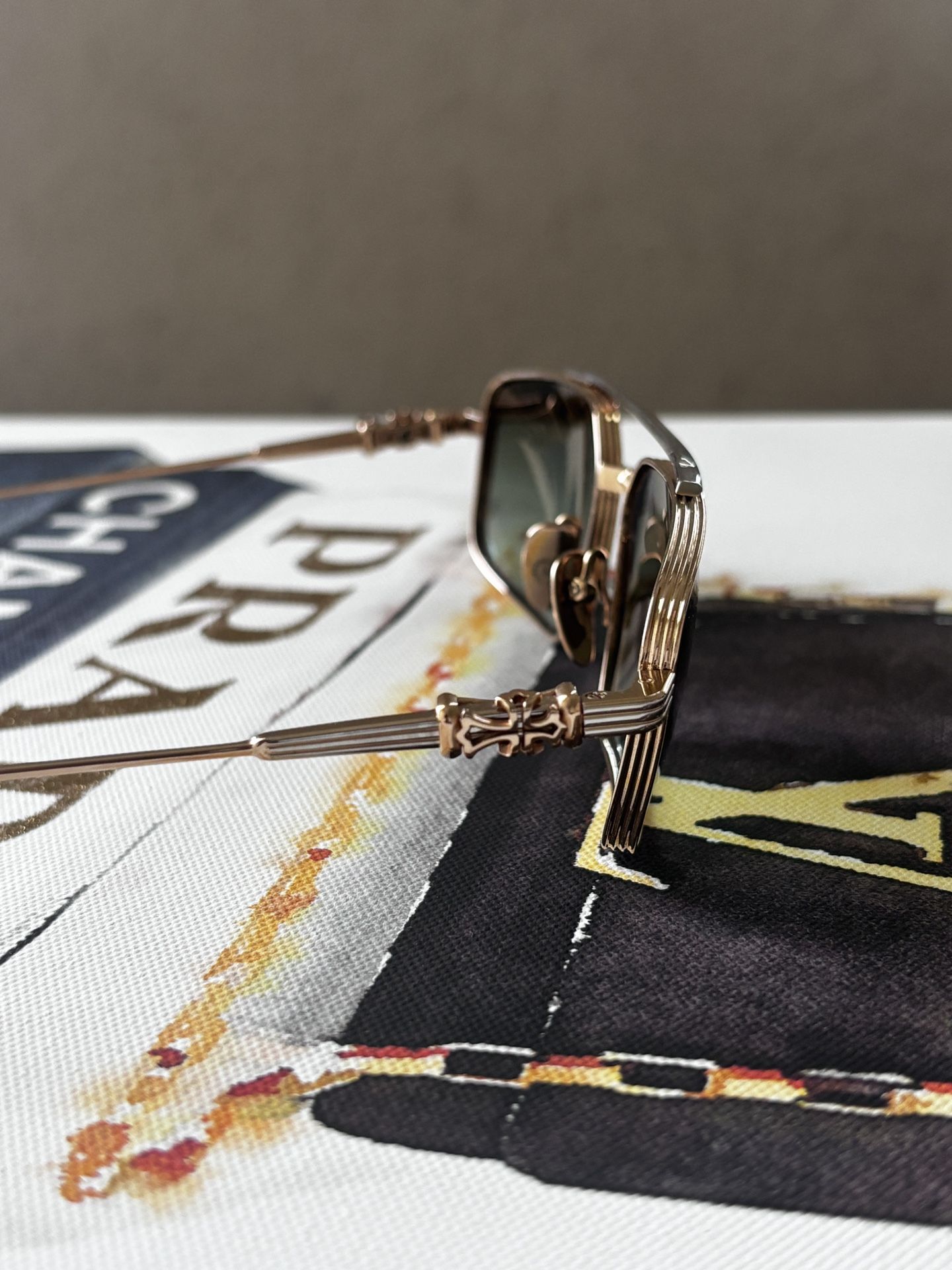 Chrome heart gold gusher sunglasses