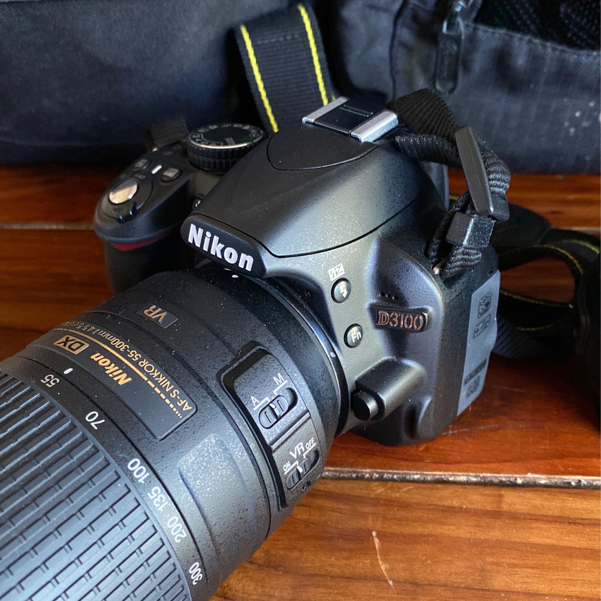 Nikon D3100 + 55-300mm Lens+35mm Lens+ Lowepro Bags