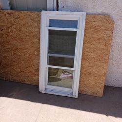 Vinyl double glass window House looks  like new 24"x48"4"thick