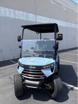 2026 Voyager Commander 4 Forward Non-Lifted 72-Volt Lithium Street Legal LSV Golf Cart in Metallic Sky Blue Gloss w/ Black seats with Sky Blue piping 
