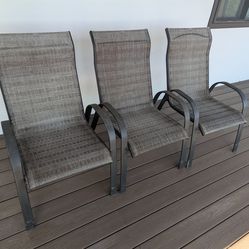 Three patio chairs