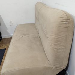 Convertible camel suede and black futon couch