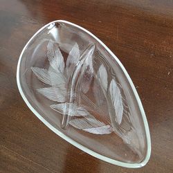 Clear glass divided relish dish with raised leaf design