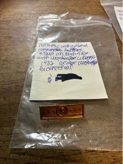 Vintage medallions from different organizations and pins