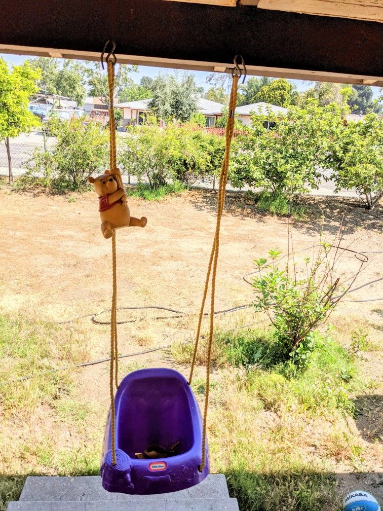 little tikes winnie the pooh swing purple