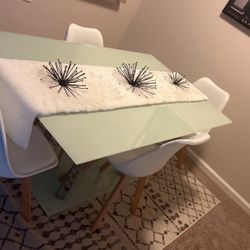 Nice Glass Table With Brand New White Chairs 