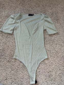 Pretty little thing body suit size 2