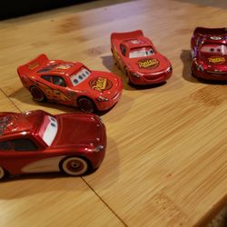 Lot of 4 Disney•Pixar Cars Die Cast Lighting McQueen