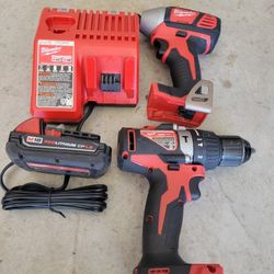 Milwaukee Hammer Drii And Impact  Charger And Battery 