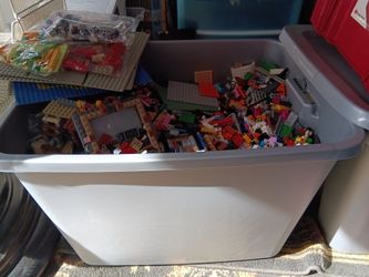 Tube of all kinds of Legos ,,Star wars,and all different sets that have been put all together