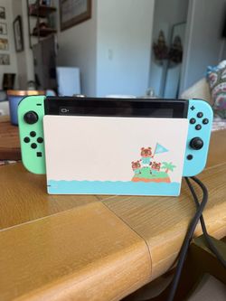 Nintendo Switch Animal Crossing Edition + 2 Games