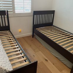 A Set Of Two Twin Size Beds With Mattress 