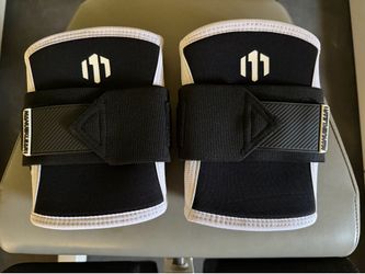 Weightlifting elbow support compression