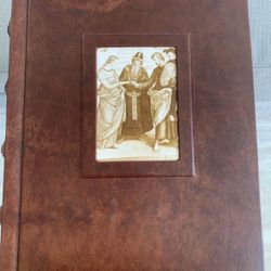 So Unique! Brown, leather bound 50 page scrapbook. Each page has a paper protective covering for items for the book. Never used Great condition. 