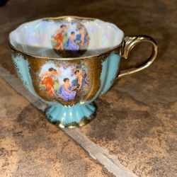 This is the backstamp on the base of your teacup, confirming it's a genuine piece of **Paragon Fine Bone China** made in England. Paragon (originally 