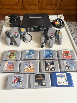 Nintendo 64 console with games