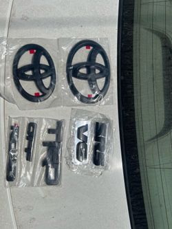 Toyota matte Black overlay badges