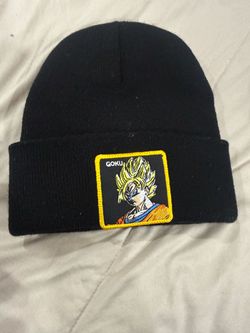 Black Goku beanie with embroidered patch featuring Goku's face