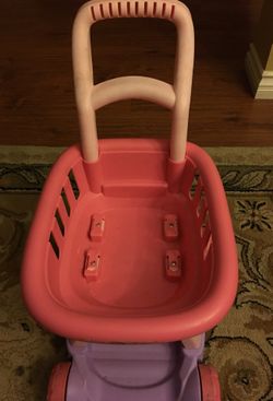 Pink little girl shopping cart