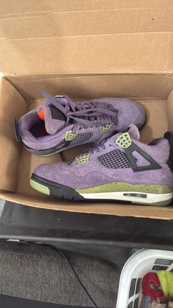 Women's size 9 or men's 7.5 canyon purple 4's