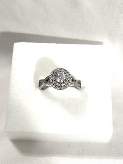 Brand new .925 silver wedding ring with cubic zirconia CZ diamonds. Size 8.
