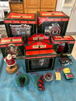 Coca-Cola Christmas village collection pieces, and ornaments