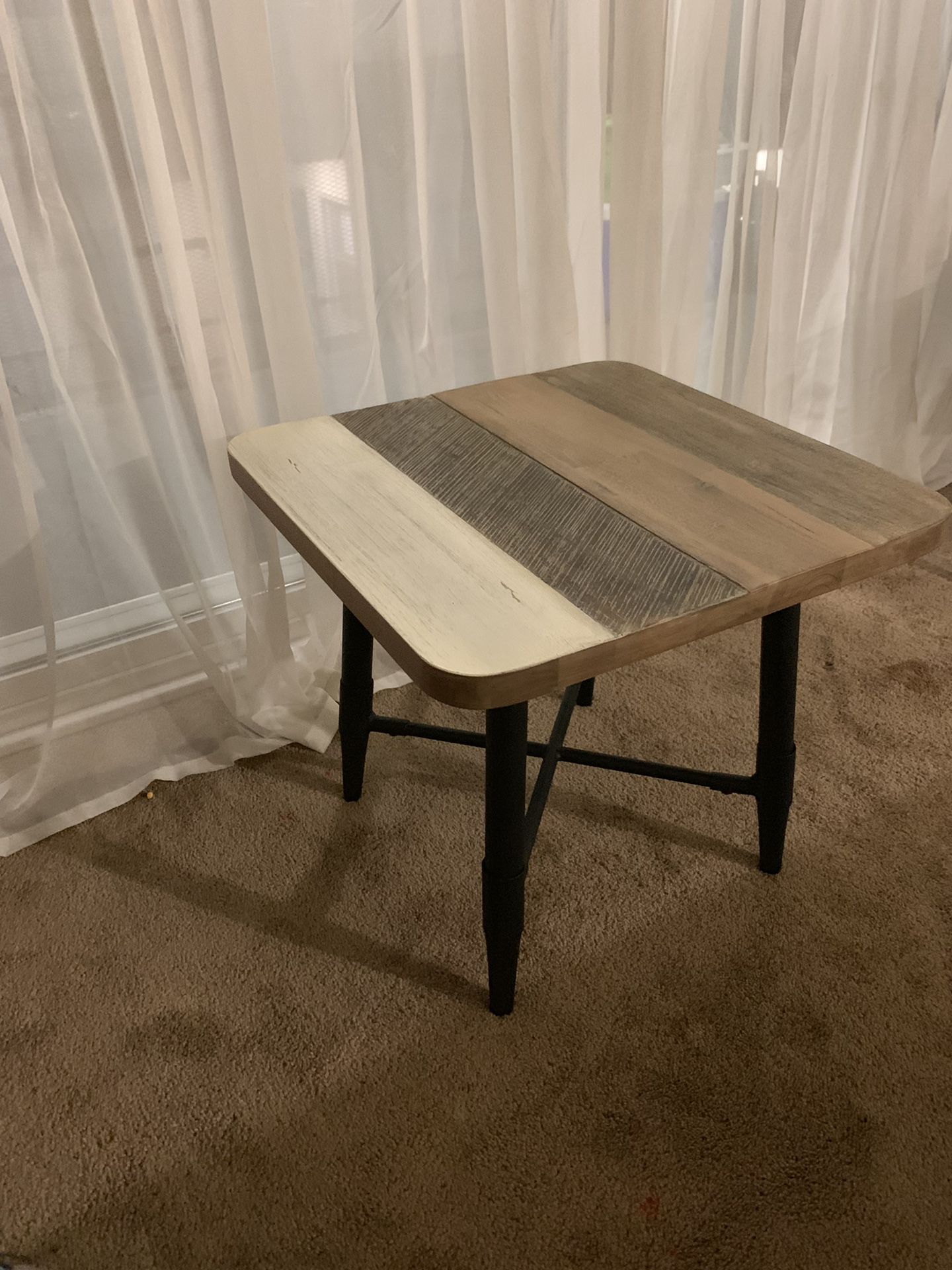 Living spaces end table.