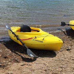 Emotion Comet River Kayak with paddle, whitewater skirt and helmat