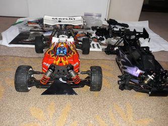 Two serpent cobra 811 buggies with parts