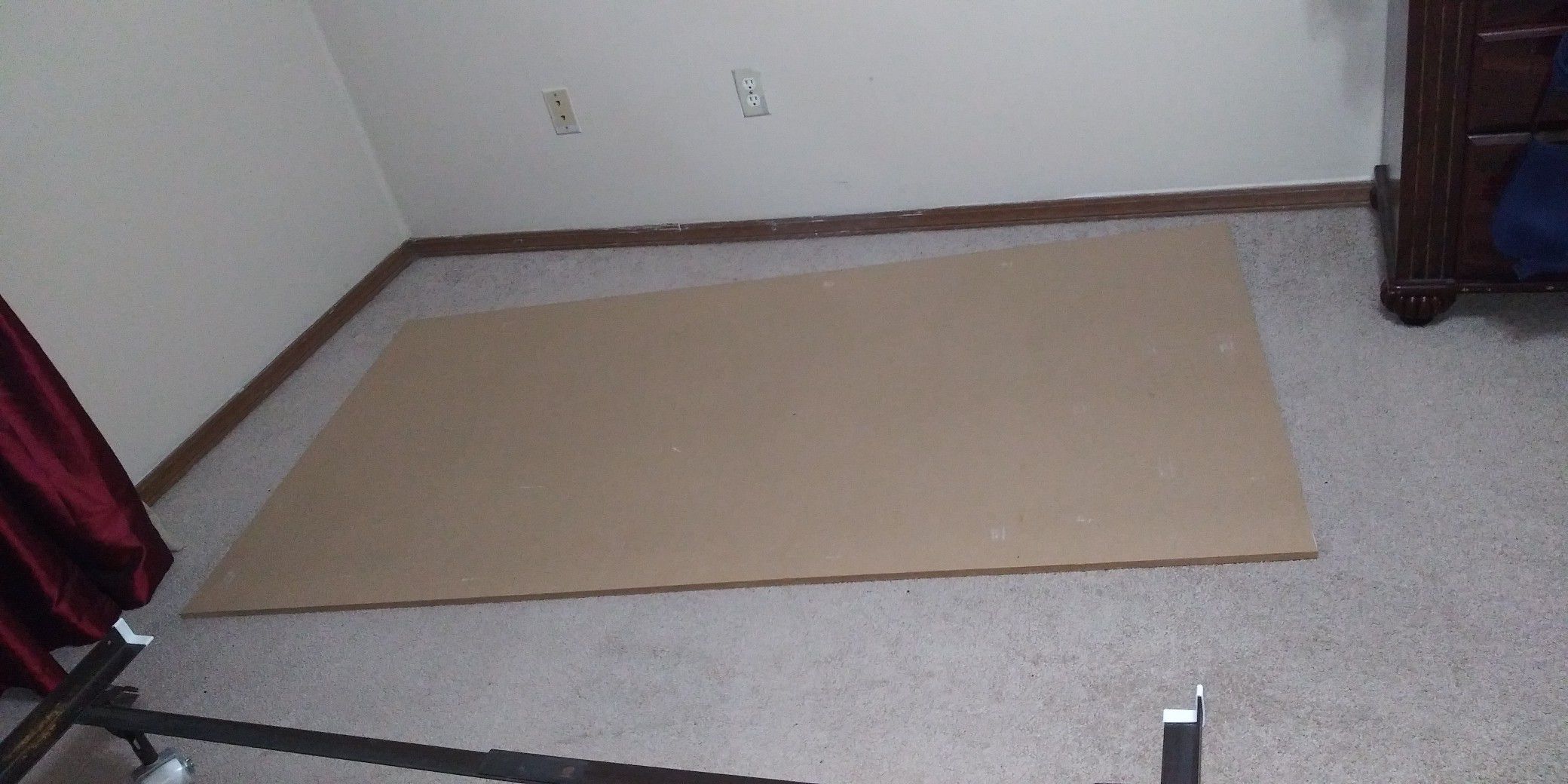 Hard board... It came with a twin sized bed