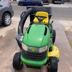John Deere riding  lawn mower