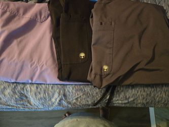 3 healing hands uniforms. Shirts 2 xl and pants 1 xl.  2 pair of healing hands pants size 1xl and 2 xl.