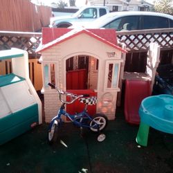 Kids Outside Cabin House & Electric Paw Patrol Car