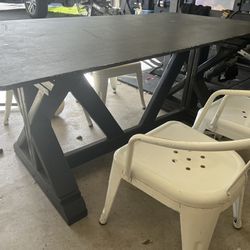 Table and Metal Chairs