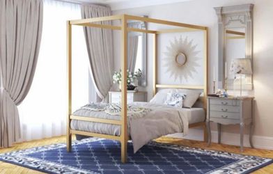 Gold canopy bed