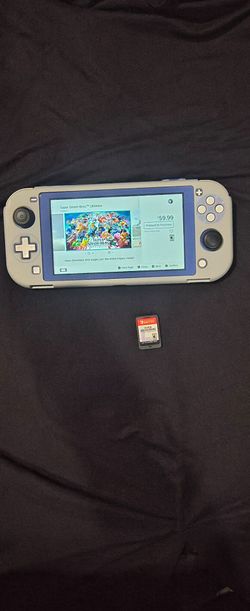 Nintendo Switch Lite - With a 128 gb Card & screen protector & game