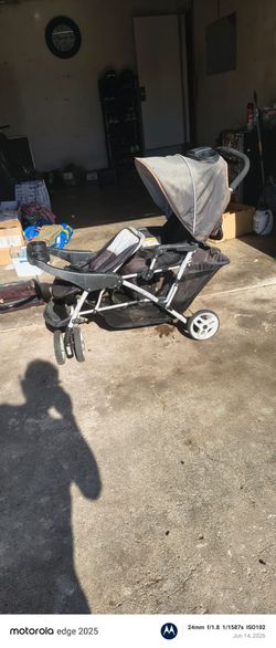 Thrower with a movable seat