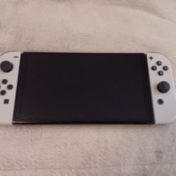NEW NINTENDO SWITCH OLED 