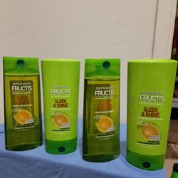 Cuatro garnier por  de shampoo 22oz y acondicionadores 21oz$20