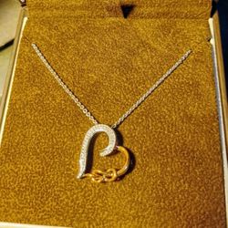 Diamond Heart Knot Necklace 1/15 Ct Tw SS./10k Gold